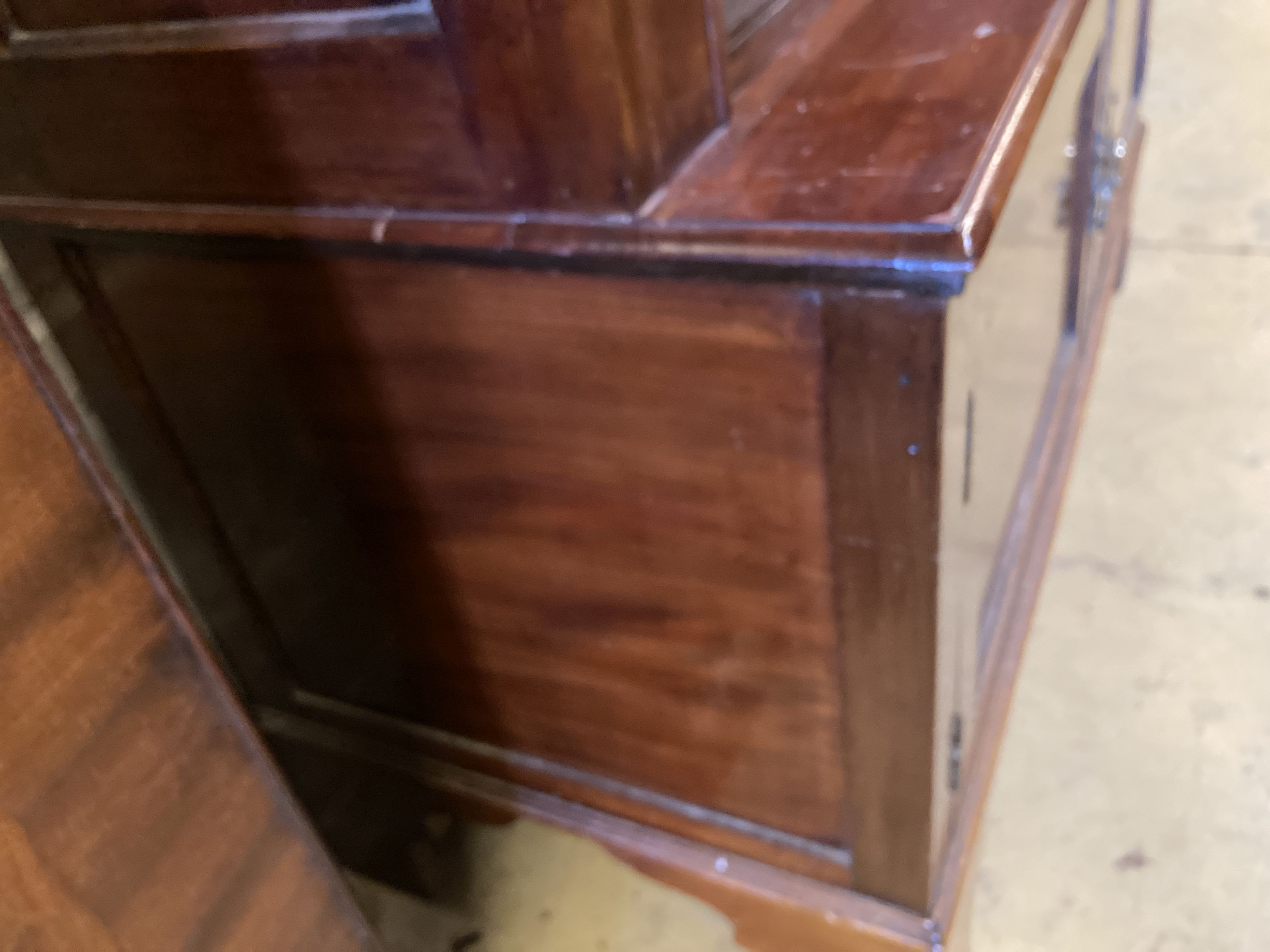 A mahogany open bookcase cupboard, length 110cm, depth 46cm, height 198cm